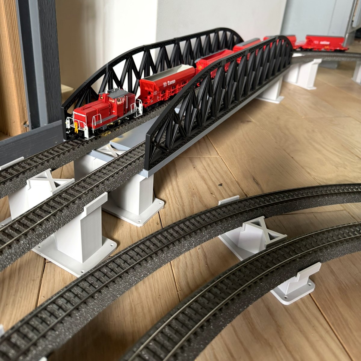 Real print: DB Cargo train crossing the printed bridge